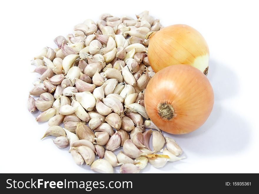 Garlic and onion on white background