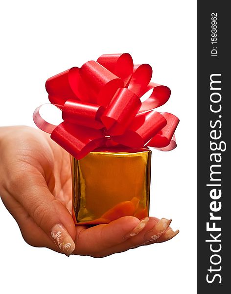 Woman hand holding a christmas gift. Isolated on white. Woman hand holding a christmas gift. Isolated on white