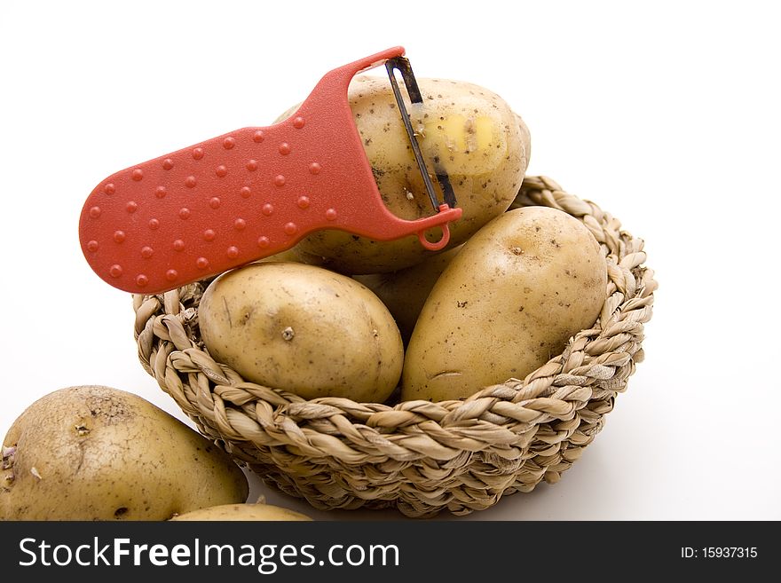 Raw Potatoes With Knife