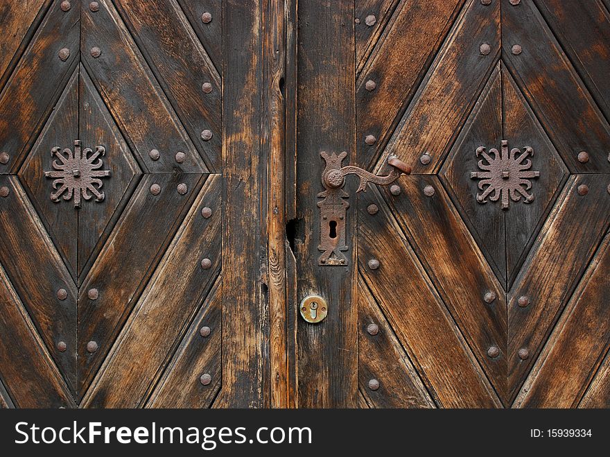 Old wooden door with aged paint texture