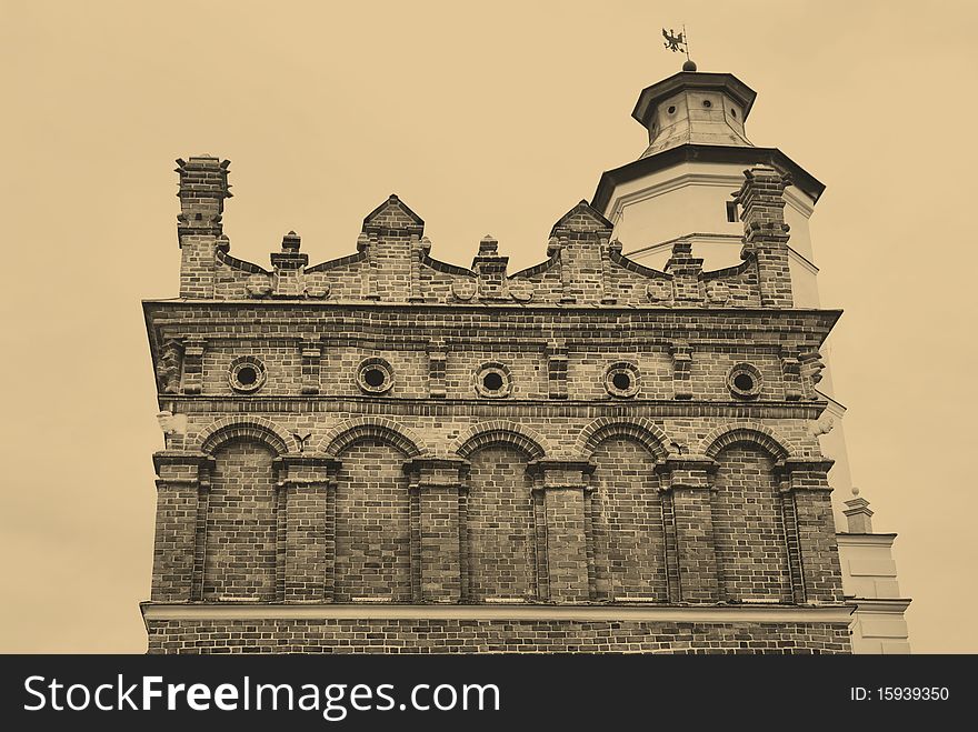 Old style photo of town hall in Sandomierz, Poland. The town hall was build in the XIV century and the tower was build in the XVII century. Old style photo of town hall in Sandomierz, Poland. The town hall was build in the XIV century and the tower was build in the XVII century.