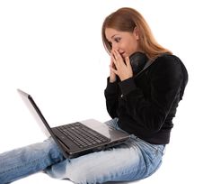 Surprised Young Woman With Headphones And Laptop Stock Photos Surprised Young Woman With Headphones And Laptop Stock Photos