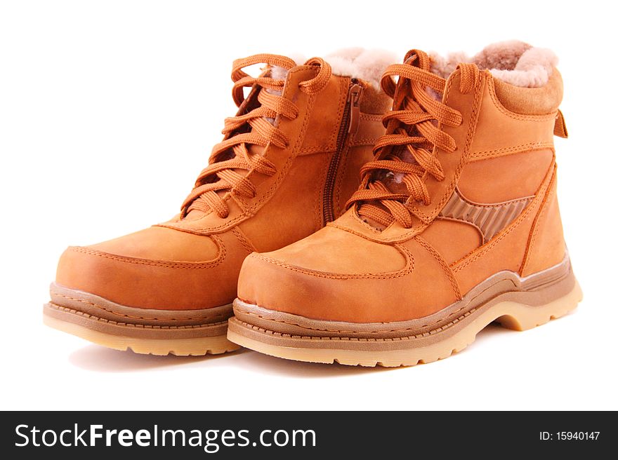 Brown boot's with a lace on a white background. Brown boot's with a lace on a white background