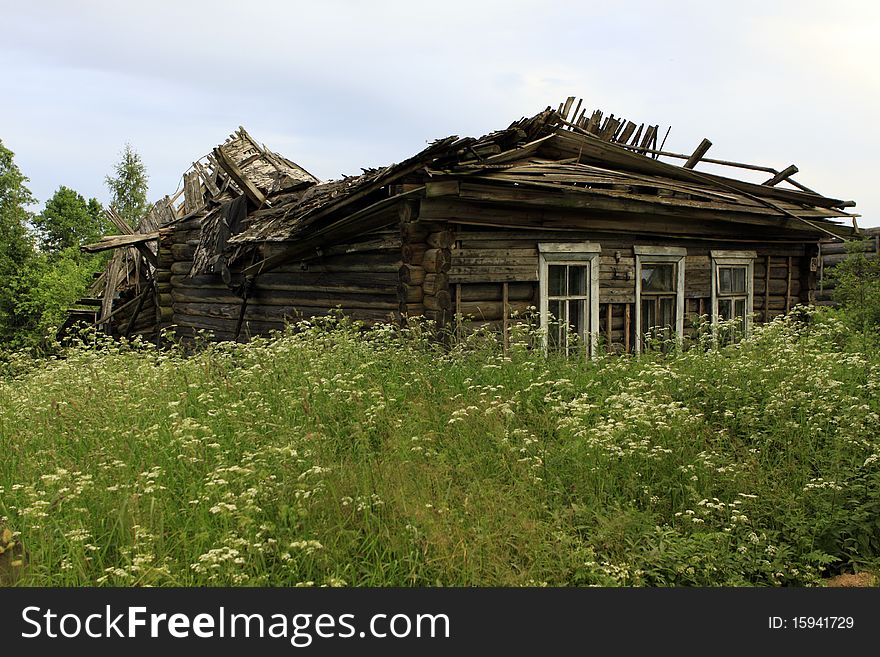 The thrown log hut in Russian countryside