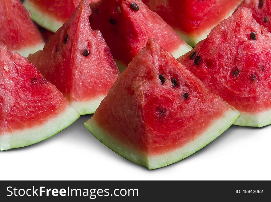 Watermelon slices isolated on white, clipping path, shallow depth of field