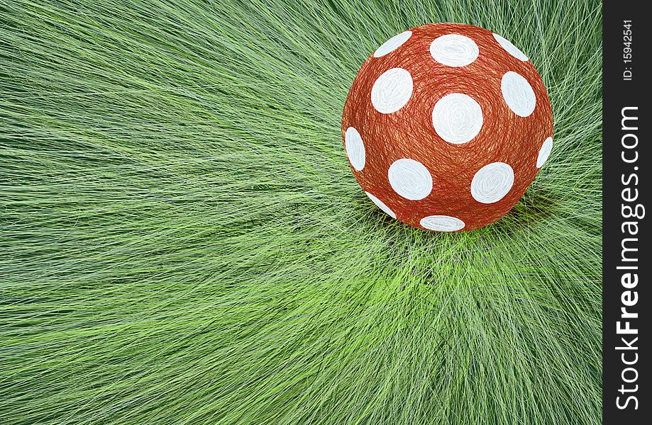 Child's ball on green grass. Child's ball on green grass