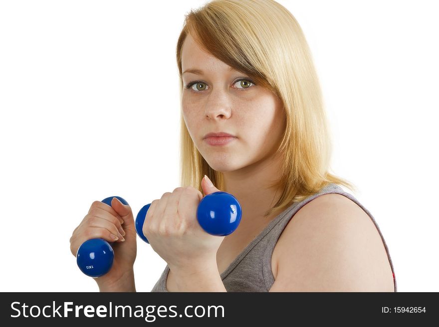 Young woman with dumbbell - isolated on white. Young woman with dumbbell - isolated on white
