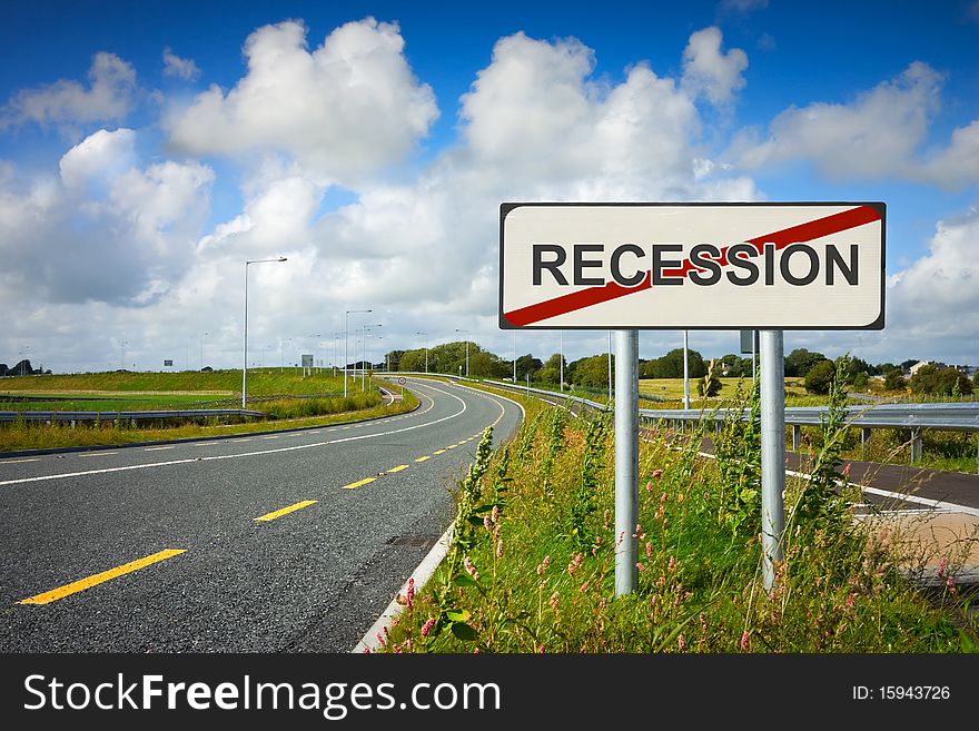 Road With Recession Sign Crossed With Red Line