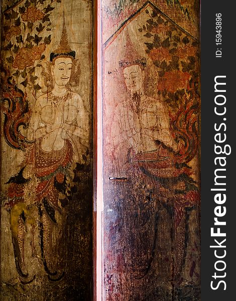 Thai ancient painting art on wood door of church