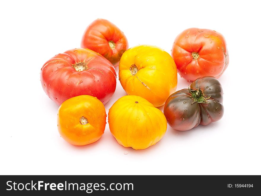 Eco friendly tomatoes on white