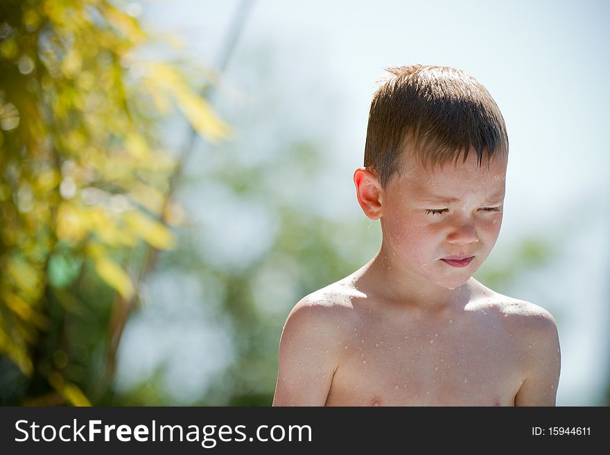 Young child in nature at a sunny day
