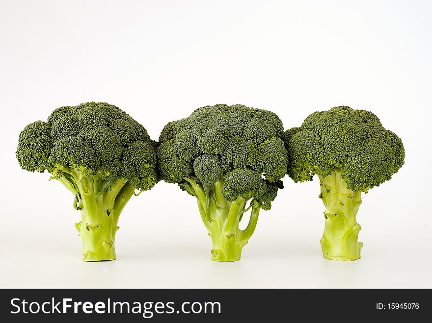 Fresh green sprouting broccoli on the white background. Fresh green sprouting broccoli on the white background