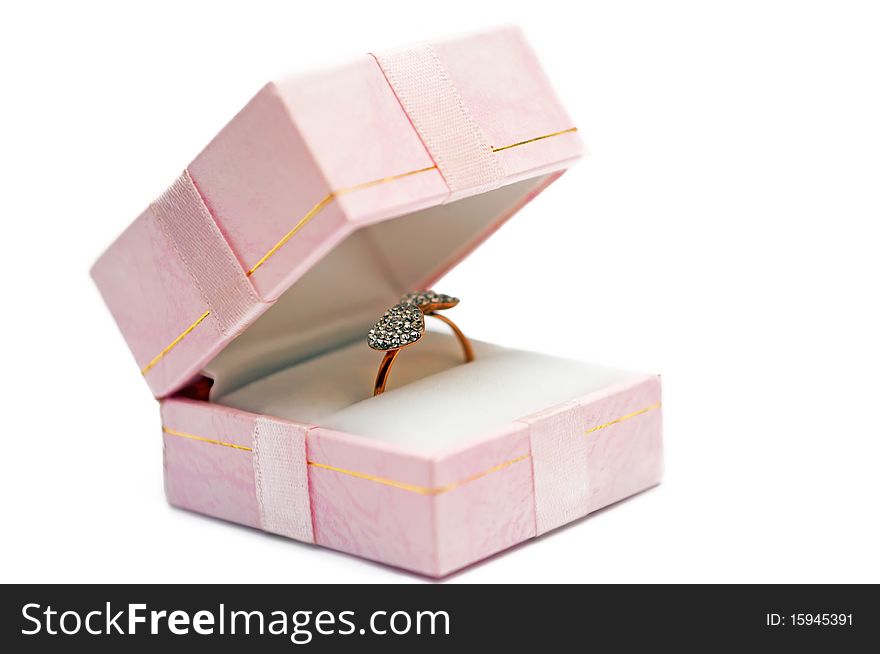 A wedding ring in the package on a white background