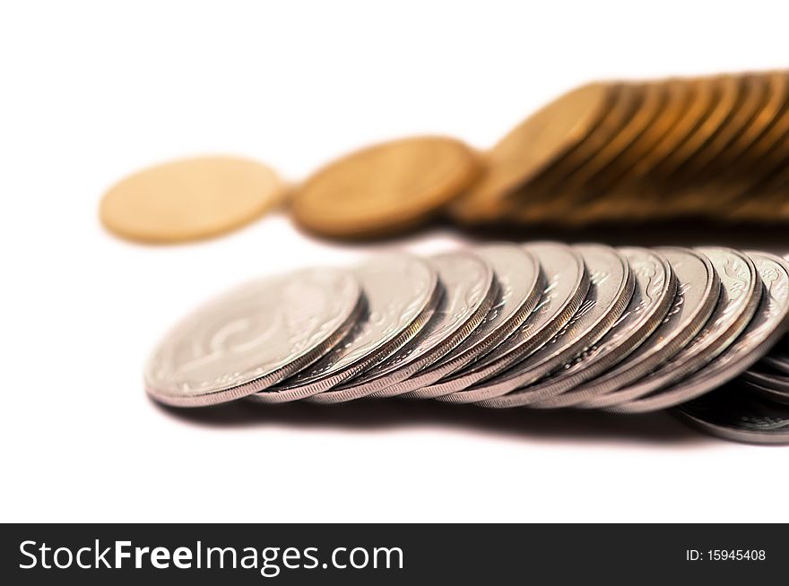 Scattered coins on a white background. Scattered coins on a white background