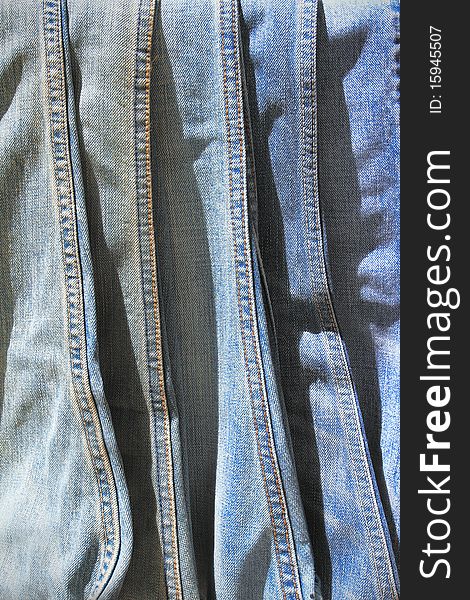 Collection of old blue jeans