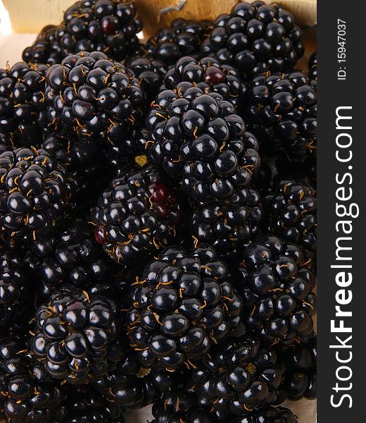 Fresh blackberries in a basket close up
