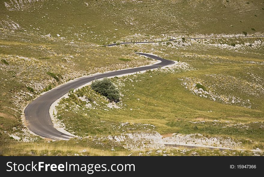 Asphalt road with many curves in Durmitor, Montenegro