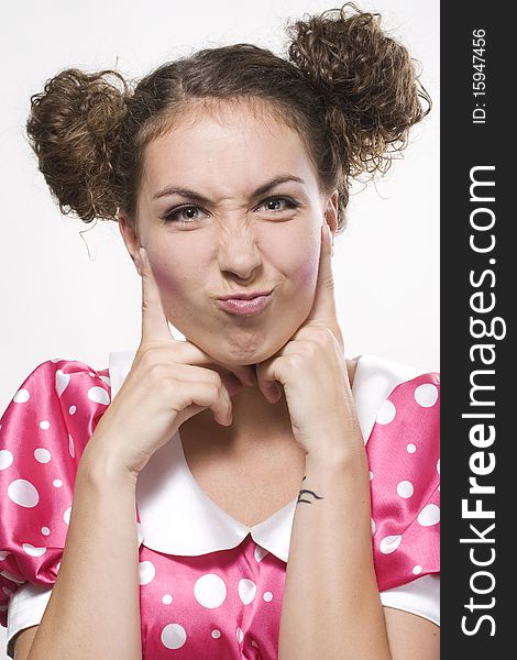 Young beautiful woman making a funny face
