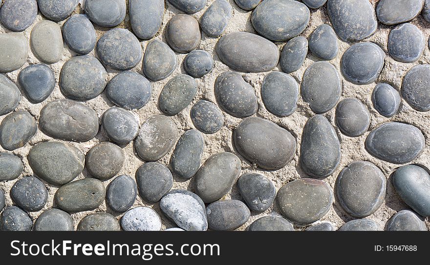 Overhead shot of pebbled pathway simulating old cobblestones. Overhead shot of pebbled pathway simulating old cobblestones.