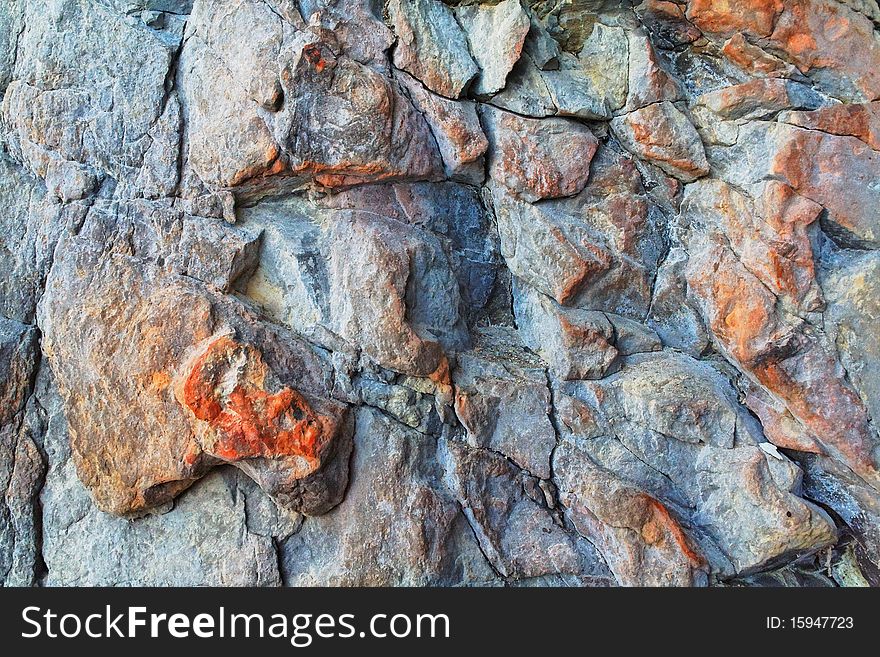 A sample of natural mountain rock texture. A sample of natural mountain rock texture