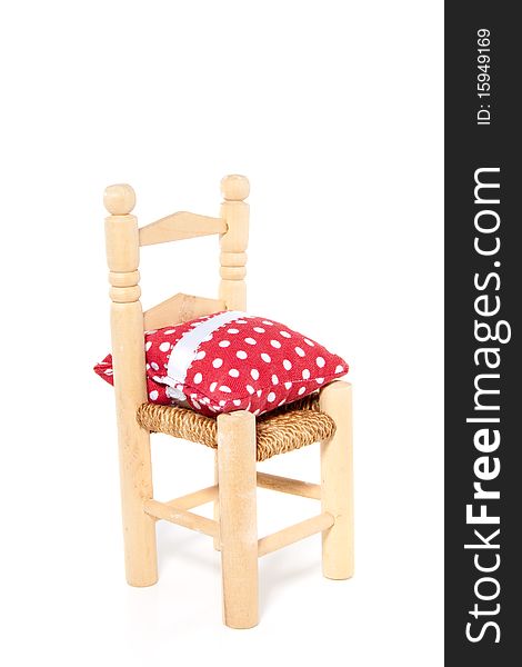 Wooden Chair With A Dotted Pillow