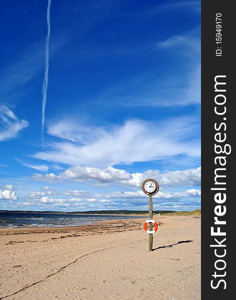 Clock on the beach