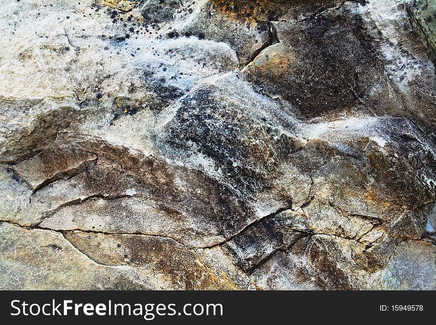 A sample of natural mountain rock texture. A sample of natural mountain rock texture