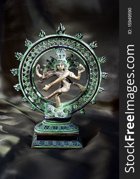 Green artwork of a dancing shiwa godess with dark background. Symbol of Hinduism and India. Green artwork of a dancing shiwa godess with dark background. Symbol of Hinduism and India.
