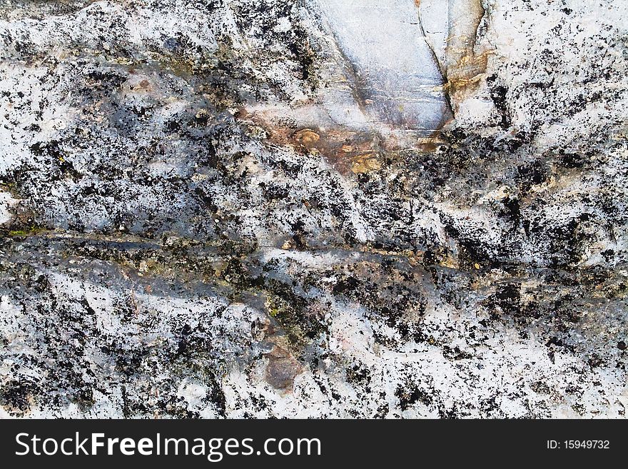 A sample of natural mountain rock texture. A sample of natural mountain rock texture