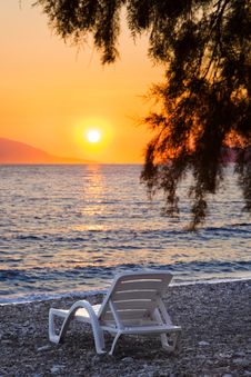 Chair On Beach At Sunset Royalty Free Stock Photos Chair On Beach At Sunset Royalty Free Stock Photos