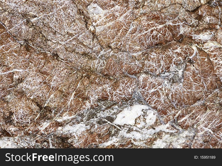 Structure of the stone laying on coast of the river. Russia. Kamchatka. Structure of the stone laying on coast of the river. Russia. Kamchatka.