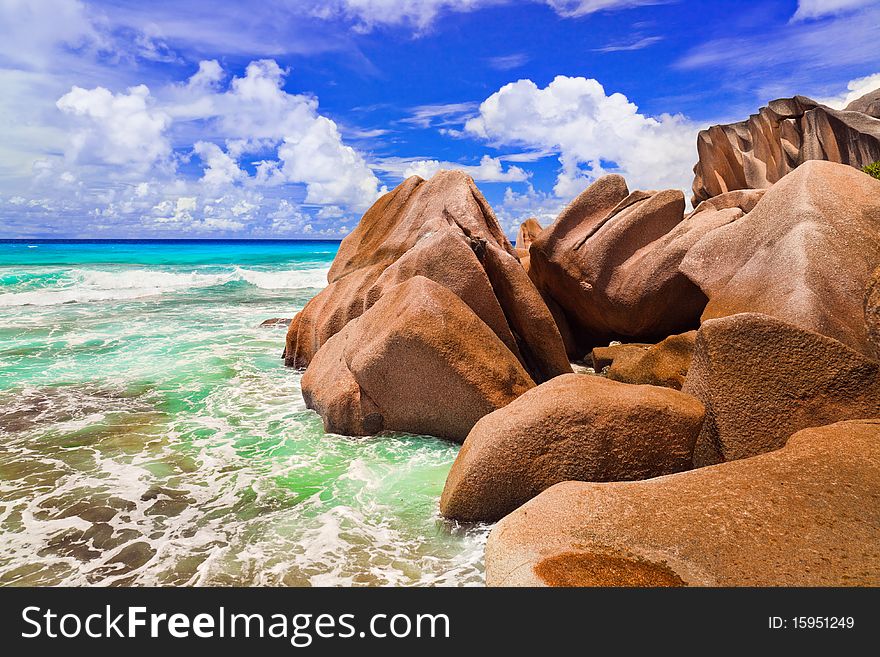 Stones on tropical beach at Seychelles - nature background