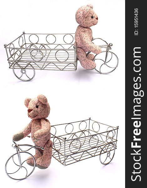 Doll bear on wire bicycle. Doll bear on wire bicycle