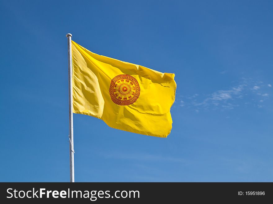 Buddhism Symbol Sway Flag on blue sky background.