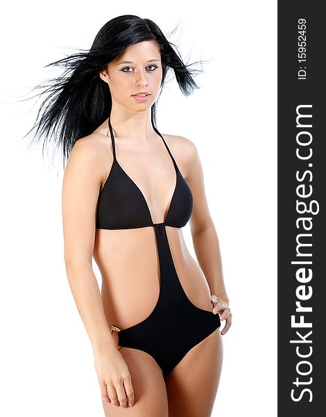 Model poses wearing black swimwear. Model poses wearing black swimwear.