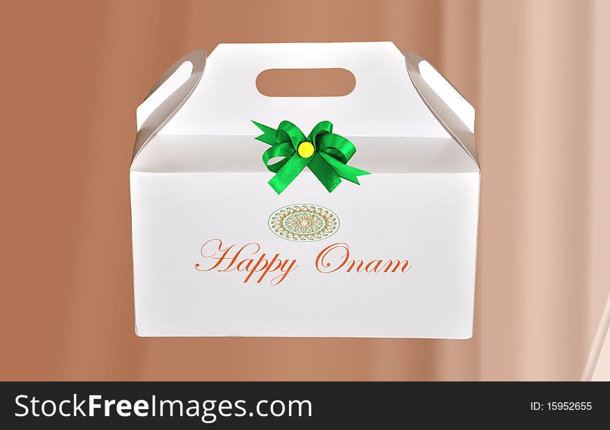 Decorated gift box with beautiful green bow. Decorated gift box with beautiful green bow.