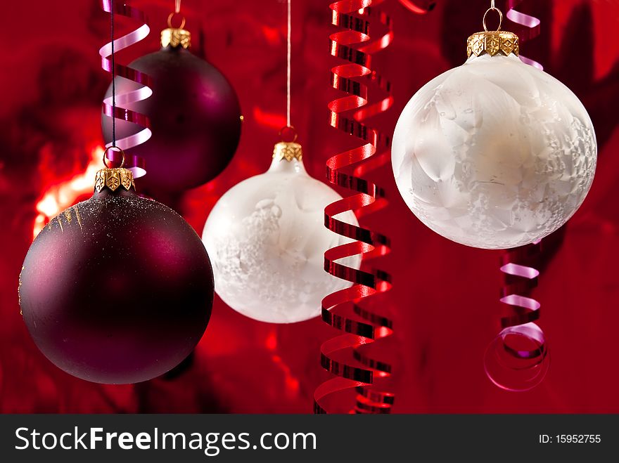 Christmas baubles and ribbons on red background. Christmas baubles and ribbons on red background
