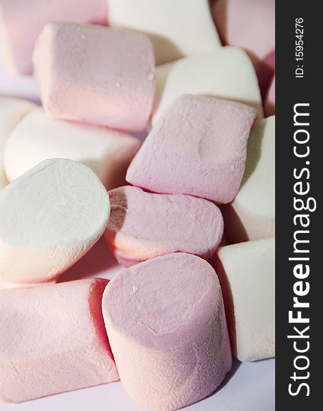 Close up of pink and white marshmallows