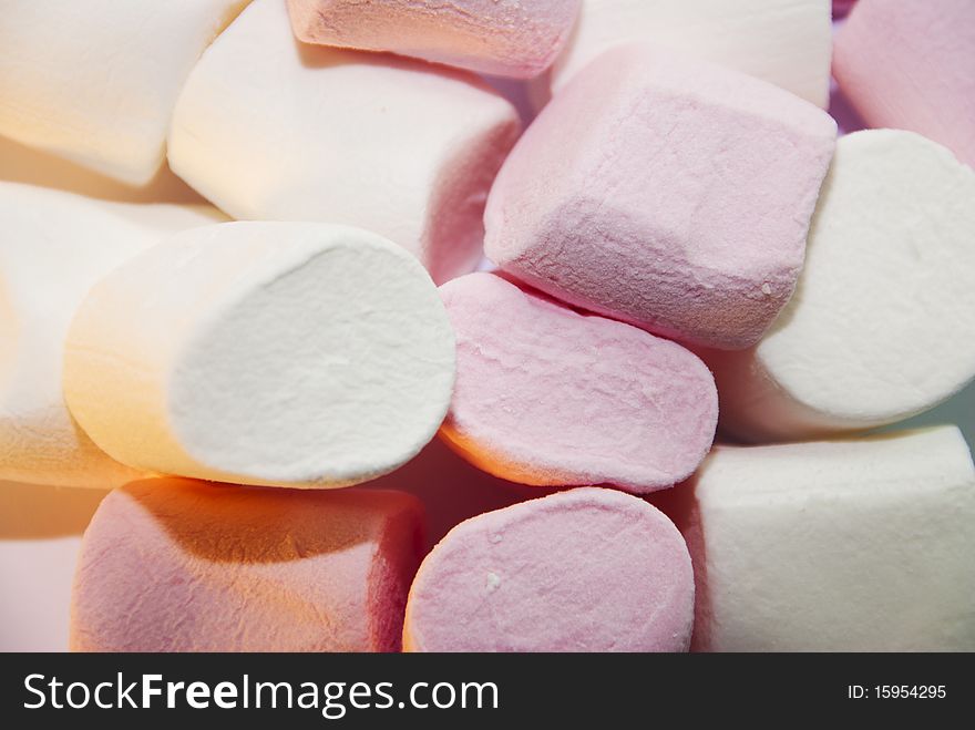 Close up of pink and white marshmallows