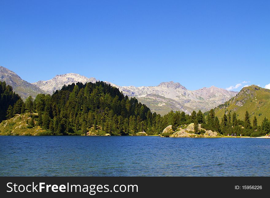 Alpine lake Cavloc Engadine in Switzerland