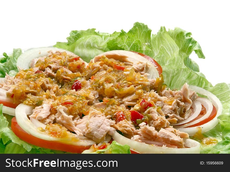 Thai spicy Tuna with Green salad onion and tomato, closeup. Thai spicy Tuna with Green salad onion and tomato, closeup
