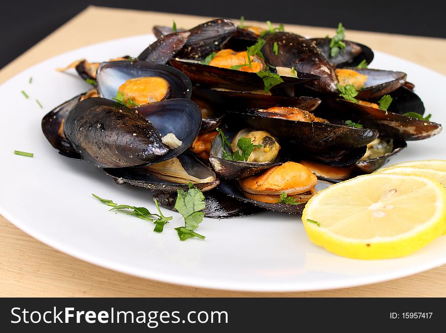 Delicious mussels with pepper and lemon. Delicious mussels with pepper and lemon
