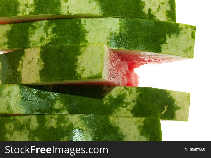 Stack of five pieces of watermelon isolated over white. Stack of five pieces of watermelon isolated over white.