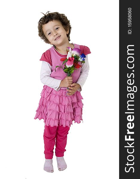 Cute young girl is holding flowers