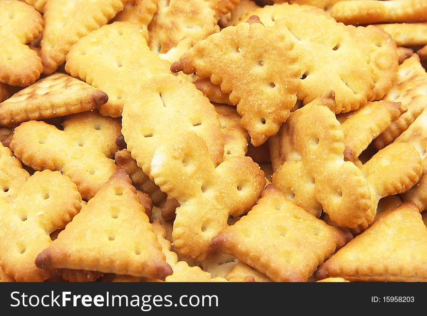 Fresh crackling crackers with salt close up. Fresh crackling crackers with salt close up