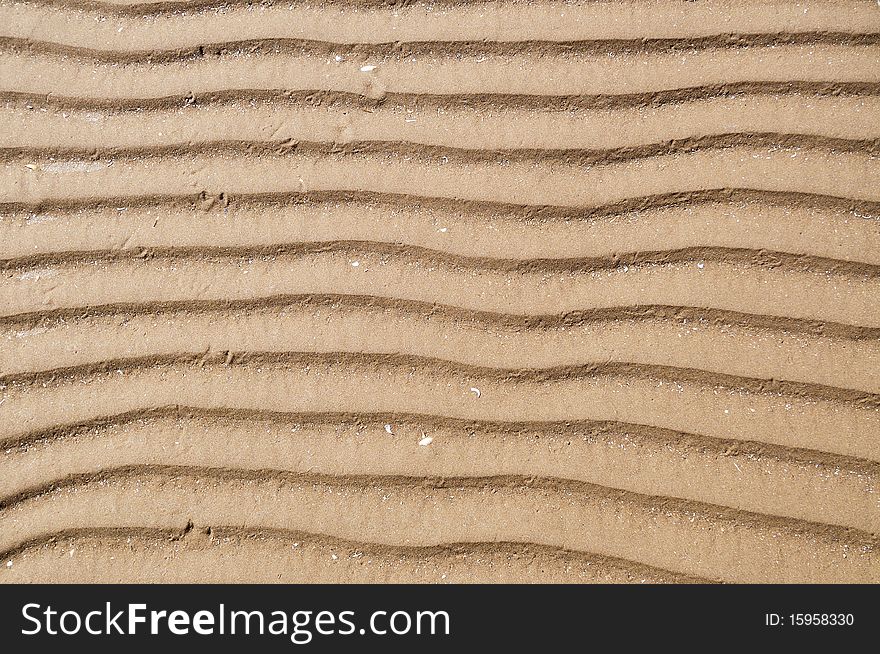 Close-up of sand ripples on the beach. Close-up of sand ripples on the beach