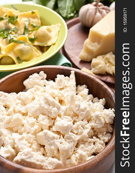 Ricota cheese in a wooden bowl