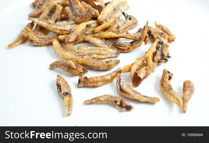 Dried tiny fish on white background. Dried tiny fish on white background