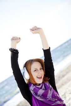 Portrait Of Red-haired Girl With Headphone Royalty Free Stock Image Portrait Of Red-haired Girl With Headphone Royalty Free Stock Image