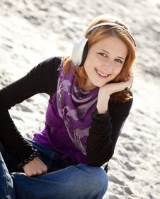 Portrait Of Red-haired Girl With Headphone Stock Photography Portrait Of Red-haired Girl With Headphone Stock Photography